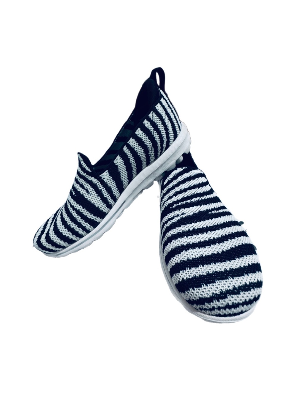 Skechers Black and White Slip-On Knit Sneakers
